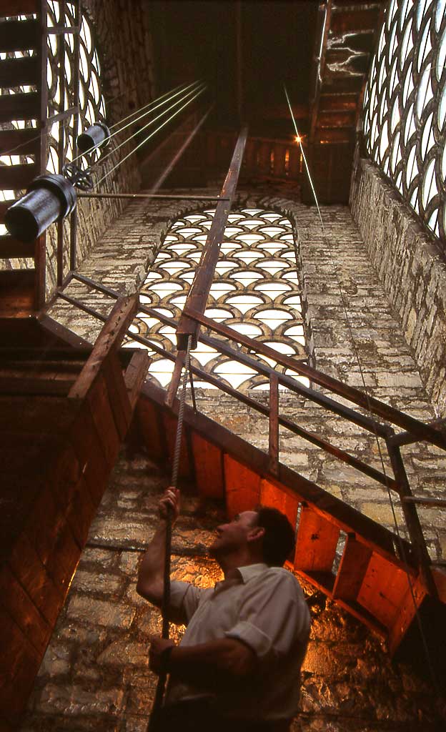 The clock winder raises the weight for the clock at St Stephen's Church, Stockbridge