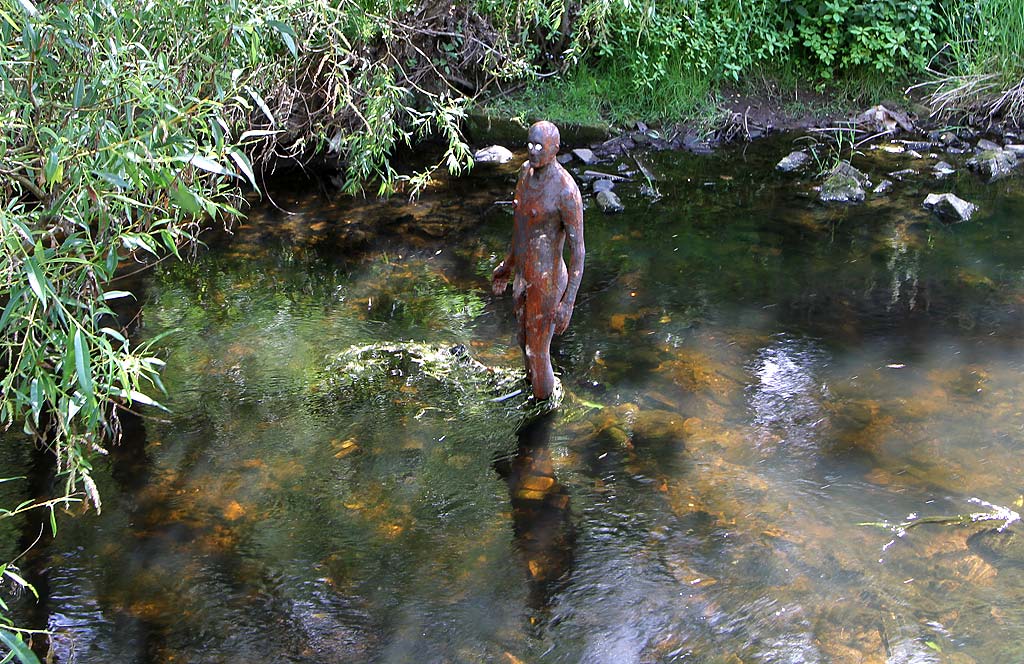 One of the livesize cast iron figures in the artwork '6 Times' by Antony Gormley. The statues