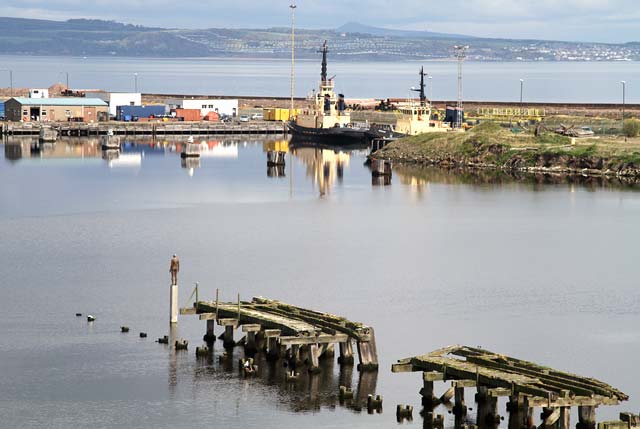 One of the live-size cast iron figures in the artwork '6 Times' by Antony Gormley. The statues are sited, most in the Water of Leith, between the Scottish National Gallery of Modern Art and Leith Docks