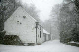 The former riding stables at Upper Spylaw Mill, beside the Water of Leith at Colinton