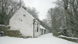 The former riding stables at Upper Spylaw Mill, beside the Water of Leith at Colinton