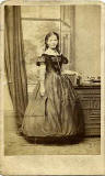 Carte de visite from the studio of George Campbell  -  lady and window