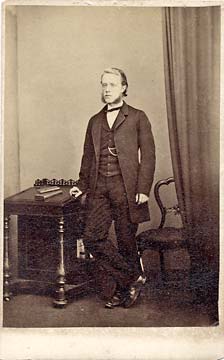 A carte de visite by John Cumming, 75 Princes Street  -  Man at Table