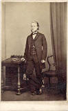 A carte de visite by John Cumming, 75 Princes Street  -  Man at Table