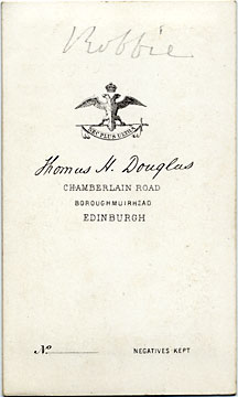 The back of a carte de visite by the Edinburgh professional photographer Thomas H Douglas  -  small girl on a chair