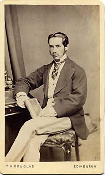 A carte de visite by the Edinburgh professional photographer Thomas H Douglas  -  young man with a book