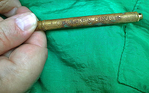 Metal Pencil Holder marked with the name of Crawford's Biscuits