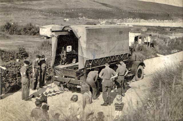 West Pilton Camp  -  The 519 LAA/SL Regt R.A. TA unit prepares for its annual camp in Norfolk