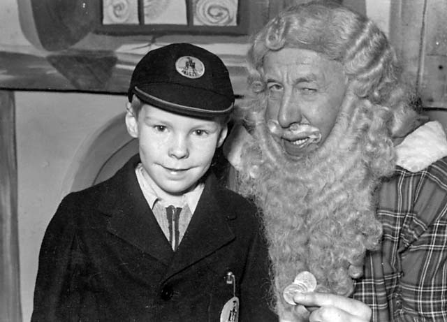 Bill Wilson, pupil at Wardie Primary School, photographed with Santa in 1954