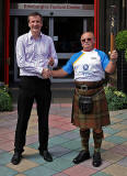 The Queen's Baton arrives at The Hub, on its way to Edinburgh Castle