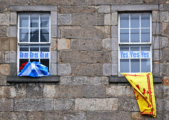 Photos taken in Edinburgh on the two days leading up to the Scottish Referendum Vote on 18 September 2014  -  Posters and Flags on Tenements at Nicolson  Street, South Side
