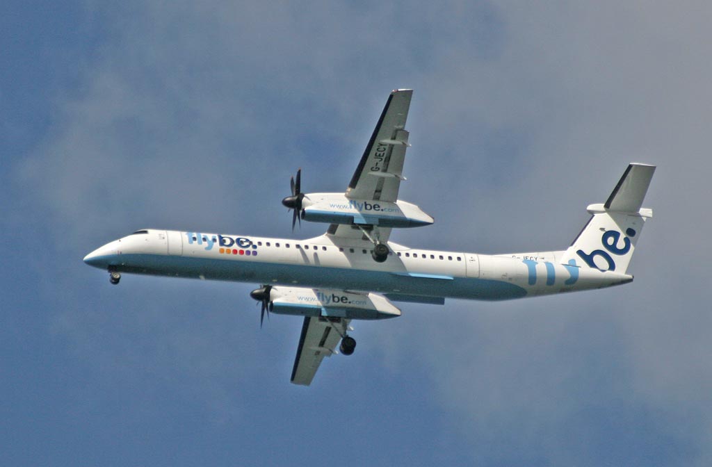 De Havilland Canada DHC-8Q-402 Dash 8 above the Firth of Forth between Granton and Cramond, approaching Edinburgh Airport, on flight to Edinburgh, August 24, 2009