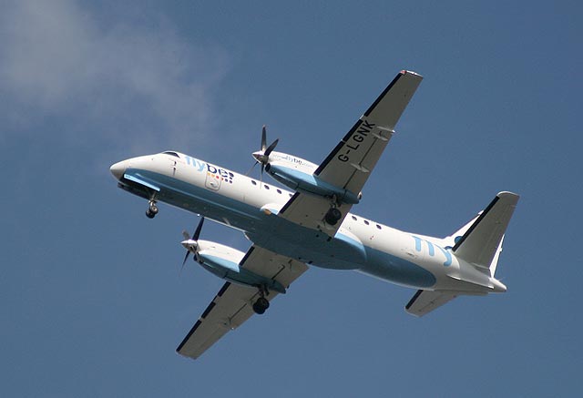 De Havilland Canada DHC-8Q-402 Dash 8 above the Firth of Forth between Granton and Cramond, approaching Edinburgh Airport, on flight to Edinburgh, August 24, 2009