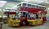 Two buses, one a Leyland Titan PD2 being painted at Seafield Paintshop
