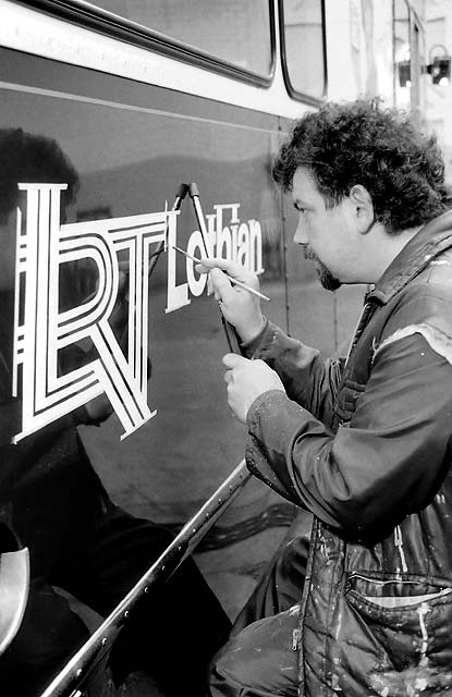 John Dickson painting the LRT prototype logo at Seafield Paintshop