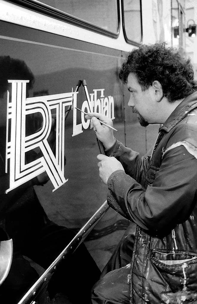 John Dickson painting the LRT prototype logo at Seafield Paintshop