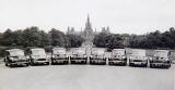 Morris Minors bellonging to Edinburgh Corporation parked in front of Fettes College  -  Photograph probably taken in the 1950s