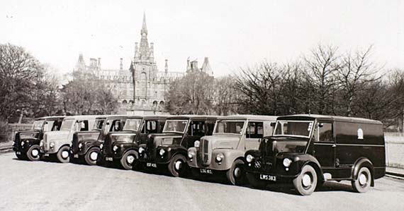 Trojan Vans belonging to Edinburgh Corporation parked in front of Fettes College  -   photographed probably in the 1950s
