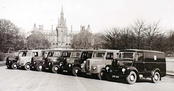 Trojan Vans belonging to Edinburgh Corporation parked in front of Fettes College - photographed probably in the 1950s