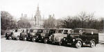 Trojan vans bellonging to the City of Edinburgh parked in front of Fettes College  -  Photogrpah probably taken in the 1950s