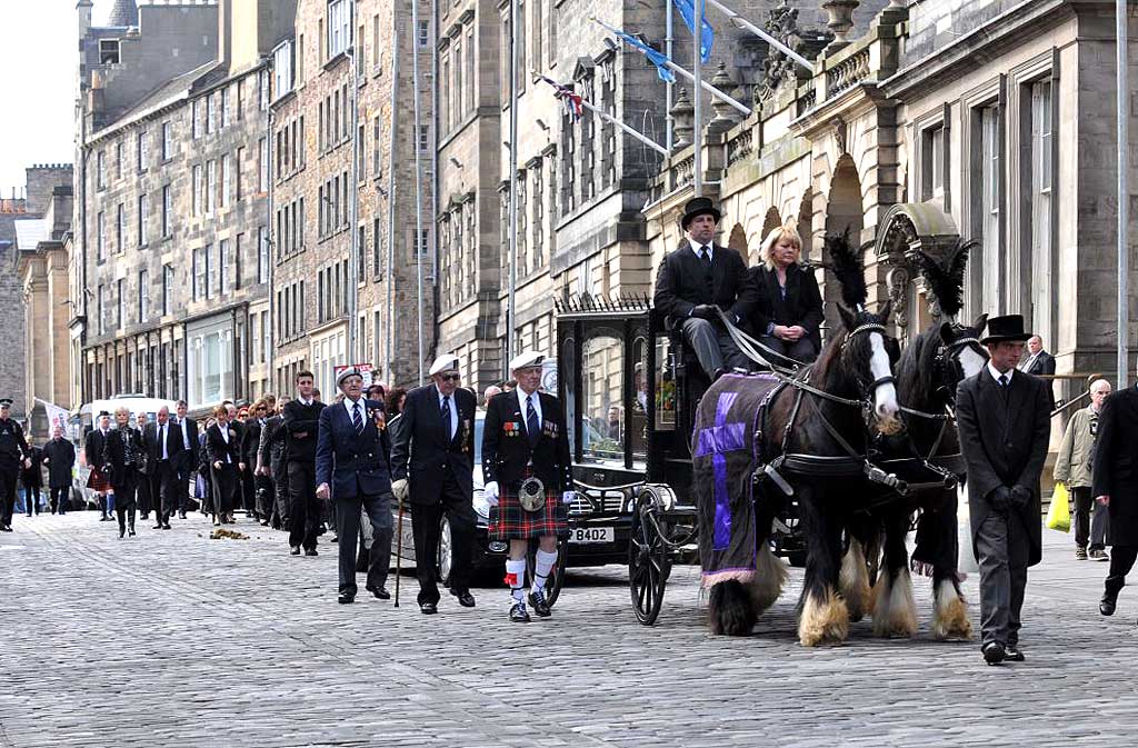 The Funeral Procession for John Burns passes down the High Street