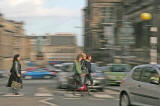 Pedestrians crossing Chambers Street heading towards the National Museum of Scotland