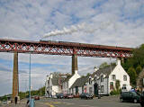 A Scottish Railway Preservation Society steam train excursion around the Edinburgh South Suburban Line and Fife Circle line crosses the roundabout at Cameron Toll, Edinburgh  -  May18, 2008