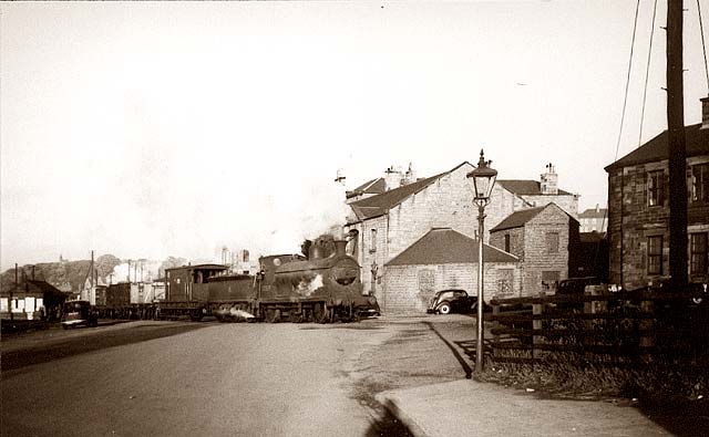 Loco crossing West Harbour Road, Granton  -  July 1, 1959