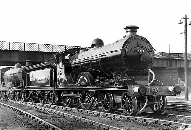 Where is it  -  Photograph of a railway line and a pram.  Possibly Newhaven or Granton