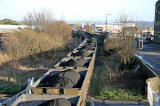 A coal train from Leith Docks passing throught the level crossing at Seafield, at the junction of Seafield Road and Marine Esplanade