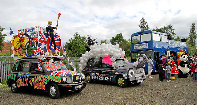 Edinburgh Taxi Trde Children's Outing, 2012  -  Two Decorated Taxis and the Disco Bus