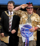 Edinburgh Taxi Trde Children's Outing, 2012  -  Edinburgh's Lord Provost presents an award to the Driver of a Taxi decorated as a Tank
