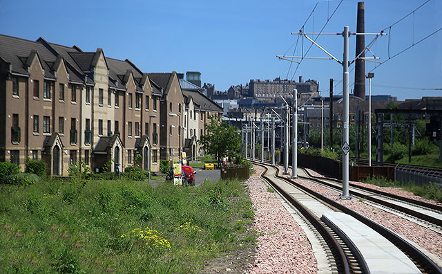 Edinburgh Tram Service  -  Edinburgh Castle can be seen on the skyline as the tram from Edinburgh Airport travels between Murrayfield Stadioum and Haymarket Station  -  June 2014