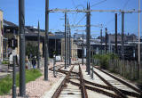 Edinburgh Tram Service  -Approaching Haymarket on the journey to York Place.  Edinburgh Castle is on the horizon -  June 2014