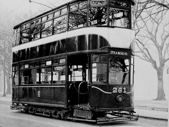 Tram 261 posed for a photograph. Was this photo taken at Bruntsfield Links or The Meadows, and when might this photo have been taken?