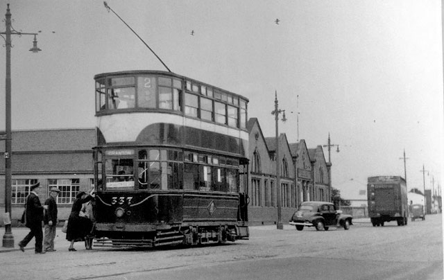 Tram outside Snow White Laundry, Stenhouse Road, Edinburgh