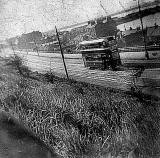 Looking down on a tram travelling up Granton Road, and Granton Harbour  -  1951