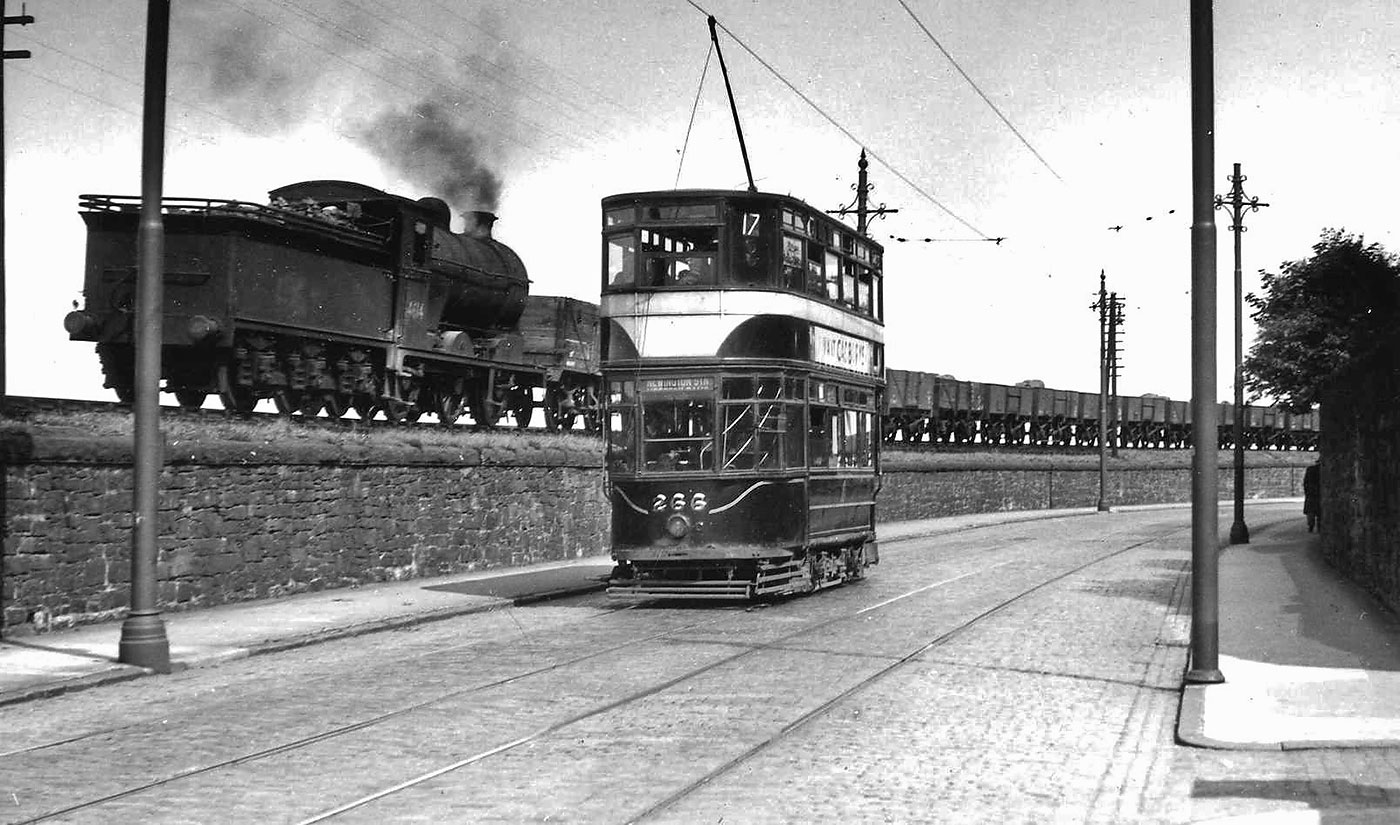Edinburgh Tram in 1950s?  -  Granton Road, with a train and Wardie Hotel beside Lower Granton Road in the background