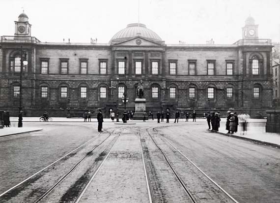 Looking down the tramlines from North Bridge to Register House