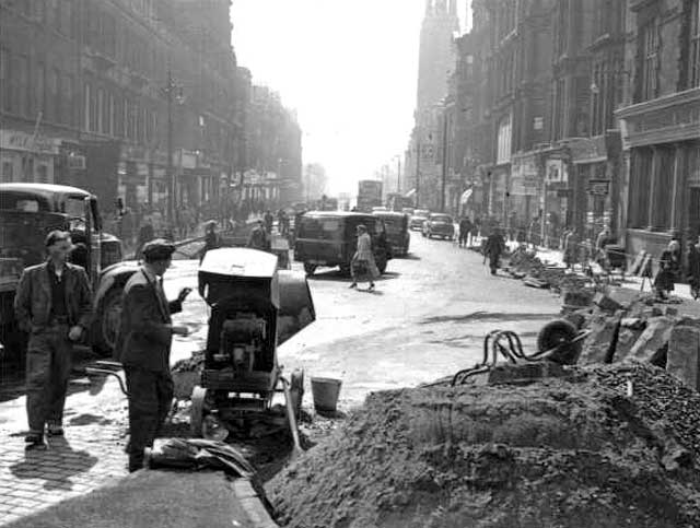 Looking to the west along Shandwick Place, towards the West End of Princes Streeet, as the tram lines were being lifted in 1955