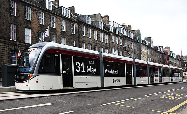 Tram in York Place in early-March 2014, announcing the date when the Edinburgh tram service will commence