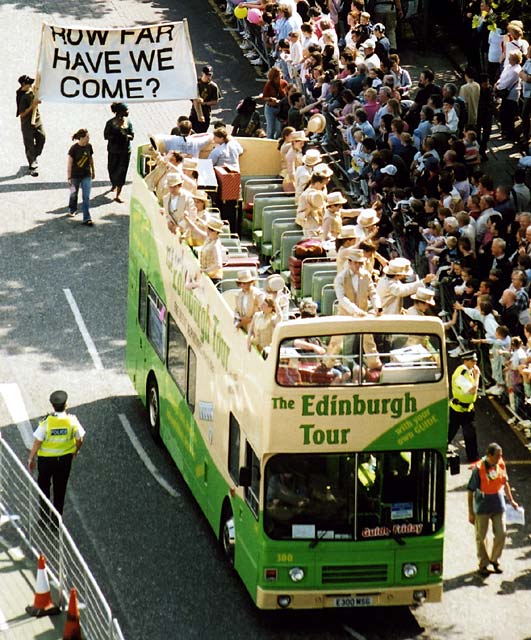 Edinburgh Festival Cavalcade 2004  -  Performers in Golden Costumes in an Open-Top Bus