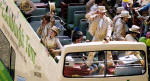 Edinburgh Festival Cavalcade 2004  -  Performers in Golden Costumes in an Open-Top Bus  -  zoom-in