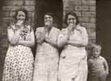 Three ladies and a young boy at East Thomas Street, around 1940