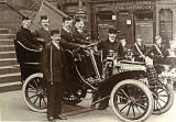 A photograph hanging on the staircase of the Leith Boys' Brigade Batallion HQ at The Pavilion, Ferry Road, Leith  -  Boys' Brigade Members and an Old Car   -  Who?  When?  Where?  And what model of car?