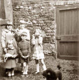 The Burns girls and others in the back garden of 160 Cnongate