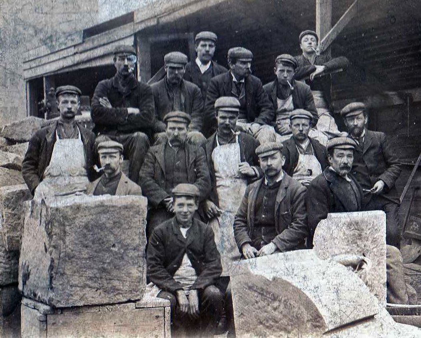 Alexander Sim Milne with his stonemason mates sitting in Colin MacAndrew’s Yard.