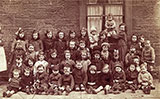 A group of kids in Drumdryan Street, Tollcross - photo taken probably around 1919