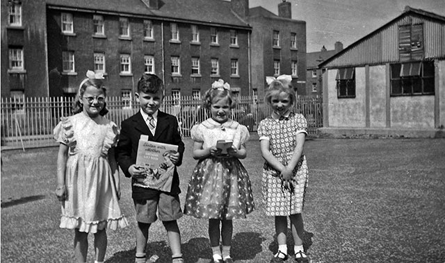 4 children in the grounds of Granton Primarey School  1955