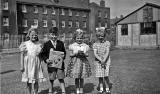 4 children in the grounds of Granton Primary School, 1955